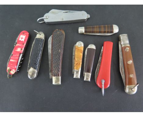 A selection of eight English mad pen knives, one multi-bladed pradel 