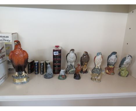 A collection of ten Beneagles ceramic whiskey bottles in the form of birds of prey and animals and five Spirit of Scotland bo