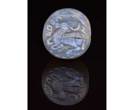 C. 224 to 651 AD. Sassanian. A beautiful Sassanian carved seal bead featuring a cloven hooved beast with recurved horns. Seal