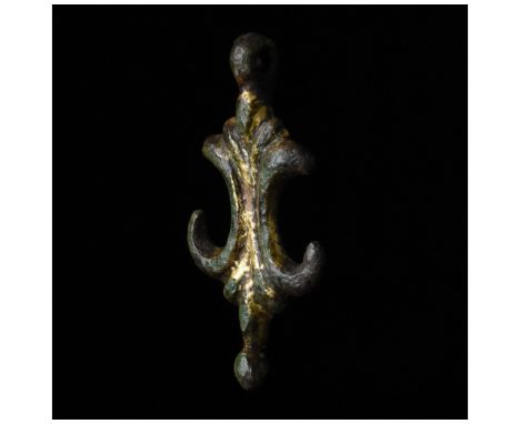 c. 1200-1600 AD, Medieval. Gilded curvilinear heraldic pendant with suspension loop. Heraldry, or the use of an inherited coa