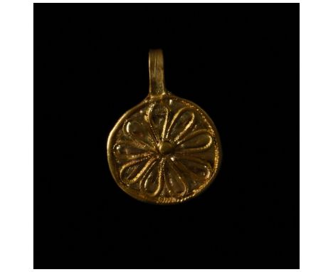 C. 1-300 AD, Roman. A beautiful gold floral pendant comprising a circular disk and an suspension loop decorated with a nine p