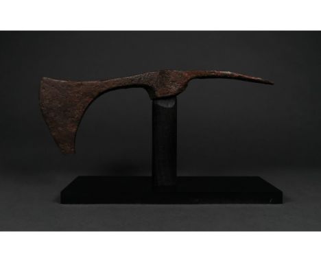 c. 900-1100 AD. Viking age. An iron bearded axe head with a curved blade, round socket and secondary pick-shaped head. The be