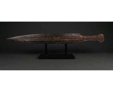 C. 600 BC. Late Archaic Greece. A beautiful iron sword with a tapering, bevelled blade, a raised midrib, and two deep, decora