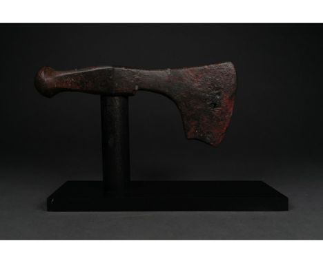 c. 900-1100 AD. Viking age. An iron bearded axe head with a curved blade, round socket and bell-shaped hammerhead. The bearde