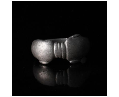 c. 1-300 AD. Roman. A heavy silver ring with a D-shaped hoop comprised of two stylised dolphins touching noses. This item pro
