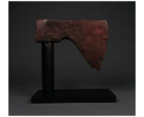 c. 800-1100 AD. Viking age. An iron bearded axe head with a heavy curved blade and a round socket. Both sides of the axe feat