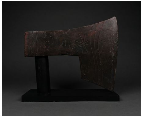 c. 900-1100 AD. Viking age. An iron bearded axe head with a heavy blade and a round socket. Etched decoration on one side inc
