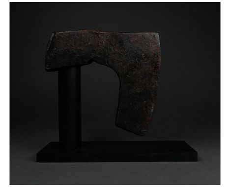 c. 900-1100 AD. Viking age. An iron bearded axe head with an elongated, heavy blade and a round socket. The bearded axe, or S