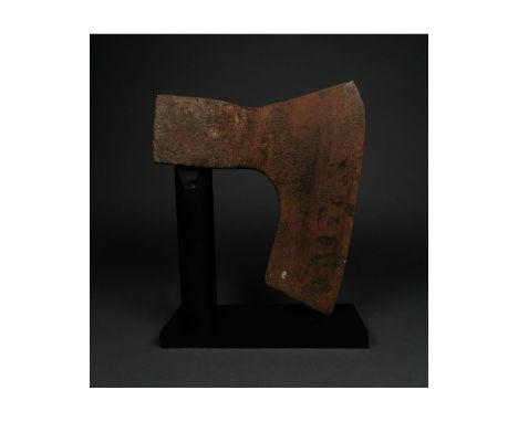 c. 900-1100 AD. Viking age. An iron bearded axe head with an elongated, heavy blade and a round socket. The bearded axe, or S