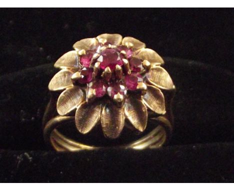 9ct Gold dress ring set with ruby cluster. Size M