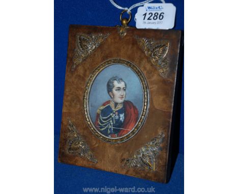 A 19th c. Portrait Miniature on Ivory of a young man in uniform, signed in pretty period frames