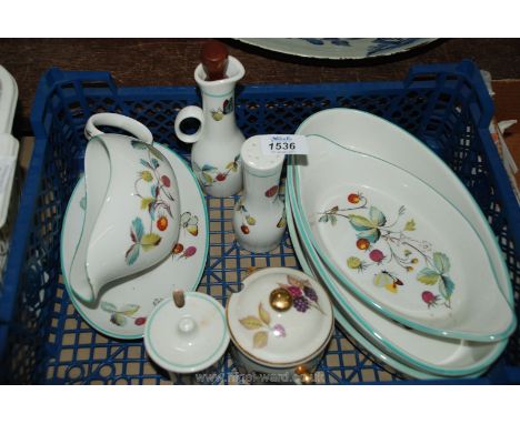 A quantity of Royal Worcester 'Strawberry Fair' china including gravy boat and saucer, serving dishes, preserve pot, vinegar 