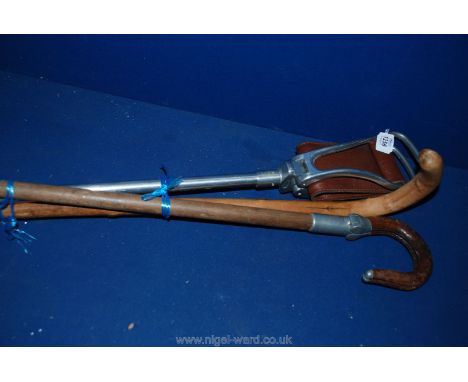 Two Shooting Sticks one having been presented to Major Hedmeads on his retirement, January 1942, plus a Walking Stick