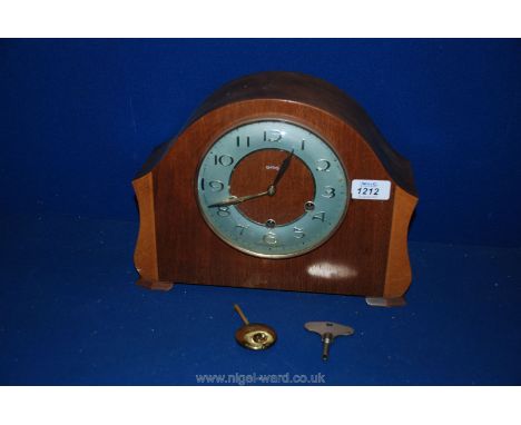 An Oak cased Mantle Clock with two train movement