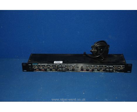 A Rack mount Alesis 3630 Compressor RMS/peak dual channel compressor limiter with gate, and power supply.