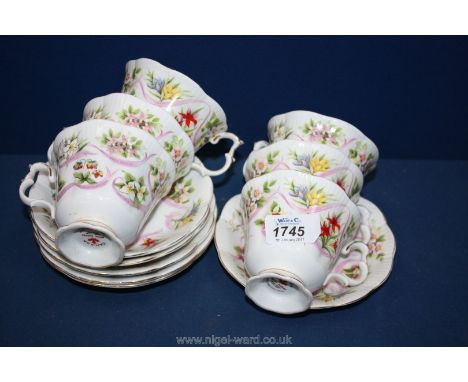Six Royal Albert 'Canada' Cups and saucers.