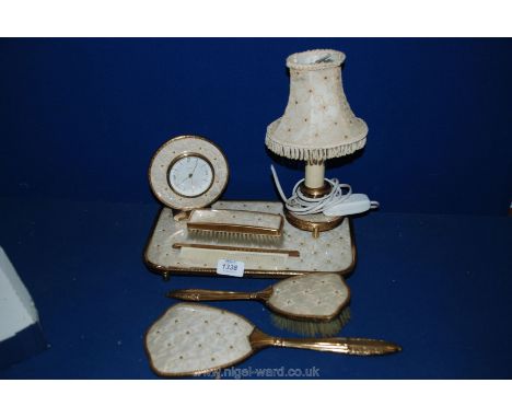 A pretty Dressing Table Set with embroidered detail including tray, clock, mirror, brush, comb and a small Lamp with matching