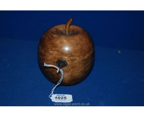 A Fruitwood Tea Caddy in the form of an apple with foil lining, 5 1/2'' tall x  4'' diameter.