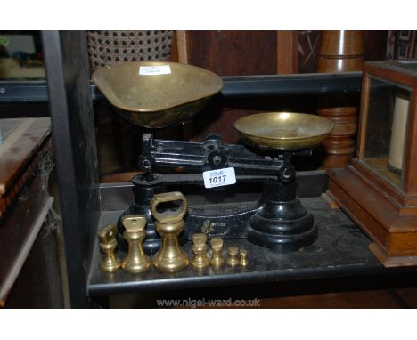 A set of Librasco Scales with seven weights from 1/4 oz to 1lb.