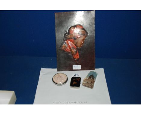 A Hindu pocket shrine, Japanese enamel match case, hand crafted copper Plaque of a female, etc.