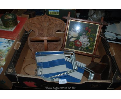 A box of miscellanea including two collapsible fishing stools, pair of shoe stretchers, wall shelf, beaded picture, etc.