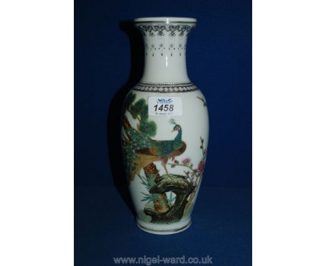 A Chinese Vase decorated with an ornamental Pheasant on a tree trunk with prunus, Chinese verse to the rear and black decorat