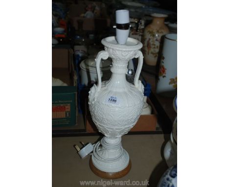 A white china Table Lamp in the form of an Urn with classical Greek style decoration, on wooden base, 16'' tall.