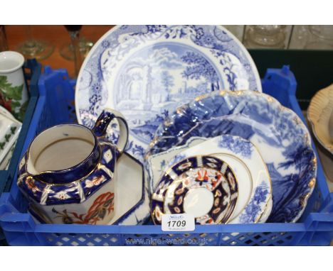 A quantity of blue and white china including Spode cake plate, Royal Doulton bowl a/f, T. Rathbone plate, Tunstall jug, etc.