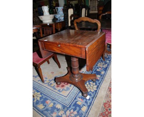 A superb early 19th c. Mahogany pedestal Sofa Table with rectangular top having two small rounded corner drop leaves and a si