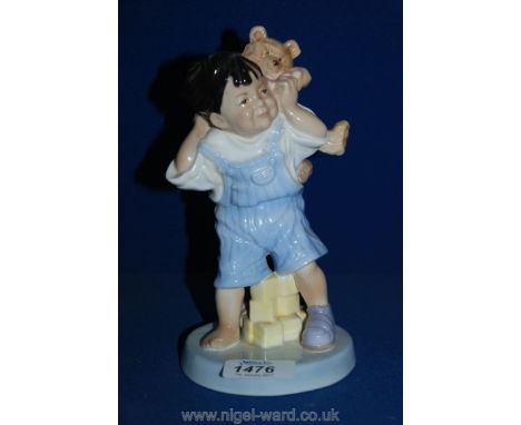 A Royal Worcester Unicef, 'Piggyback Ride' 1999 'Children of the World'.