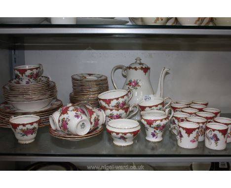 A pretty Aynsley part Tea/Coffee service, white ground with floral detail including twelve coffee cups and saucers, ten tea c
