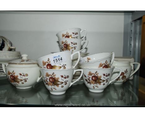 A Royal Worcester part Teaset in brown and gold autumnal design.