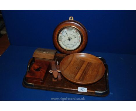 A wooden tray and a quantity of Treen including Aneroid Barometer, carved cows, small money box with key and box with bird mo