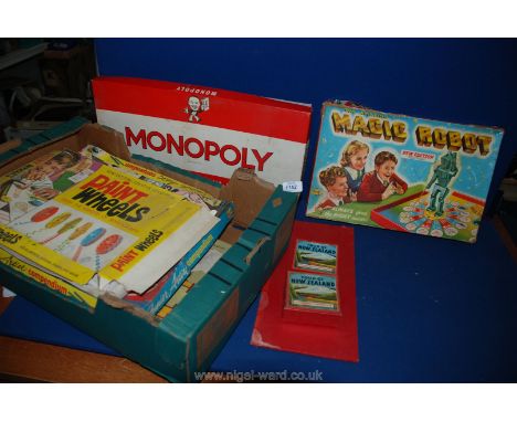 A quantity of miscellaneous games including Magic Robot, Monopoly, paint Wheels and Tour of New Zealand.