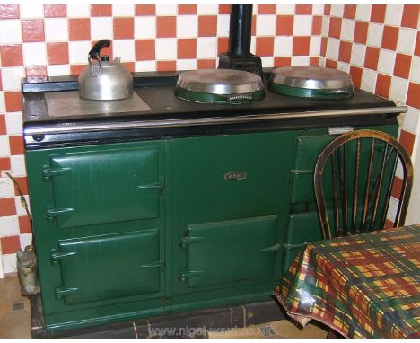 A four oven oil fired Aga in Green enamel, working prior to removal.