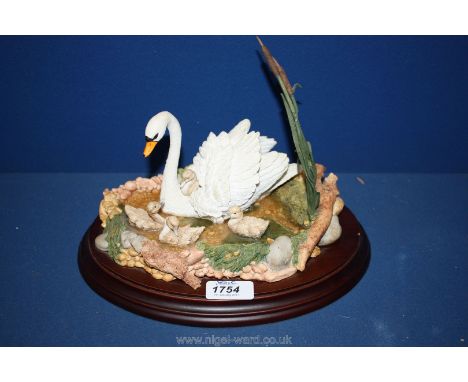 A Country Artists model of Swan and cygnets 'First Outing'.