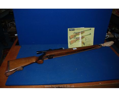A Model 50 Air Rifle with original paperwork.