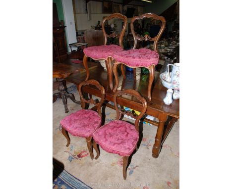 A set of four 19th c. Walnut framed Dining Chairs with hooped and carved backs, Burgundy shadow patterned button upholstered 