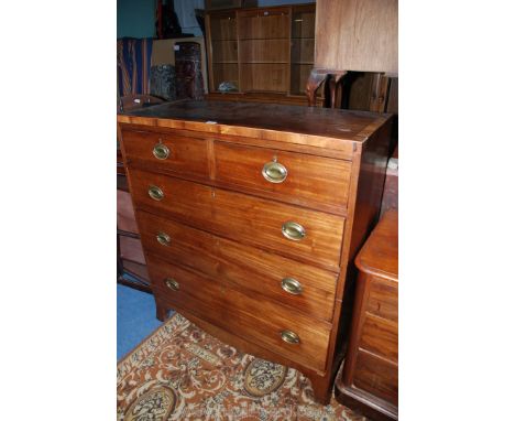 A 19th c. Mahogany Chest of two short over three long graduated Drawers, the rosewood cross-banded top made in two halves and