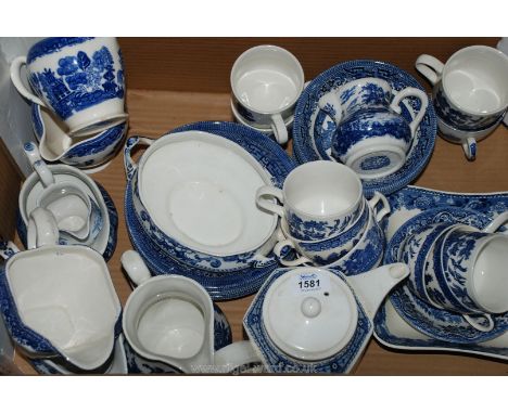 A large quantity of blue and white including Wedgwood bowl, willow jugs, cups, saucers, teapot, etc.