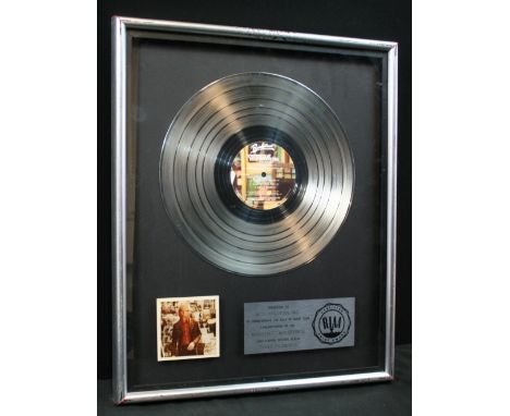 TOM PETTY & THE HEARTBREAKERS - RIAA platinum award presented to "MCA RECORDS, INC" to commemorate the sale of more than 1,00