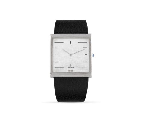 Corum Buckingham 54.121.01, 70sSterling silver rectangular case.Argenté dial with linen finishing, applied indexes.Hand-windi