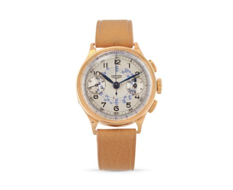 Heuer chronograph, 40s18k gold round case, n.5916, hinged case back, olive pushers.Two tone argenté dial, multi-scale, painte