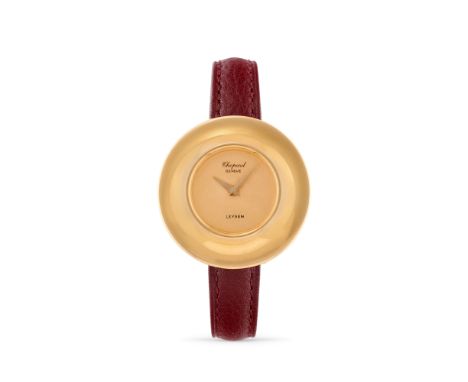 Chopard Flying Saucer retailed by Leysen, 70s18k gold round flared case, n.95900.Champagne dial with grené finishing.Hand-win