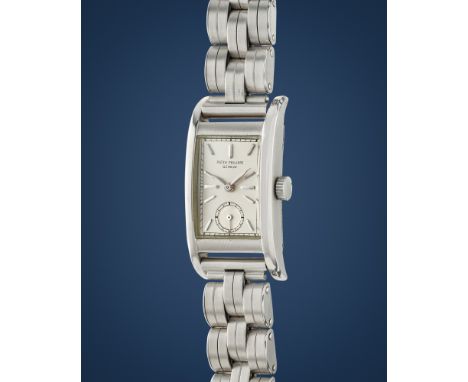 Patek Philippe 492, 30sStainless steel curved rectangular case, n.614922.Argenté dial, applied indexes.Hand-winding movement,