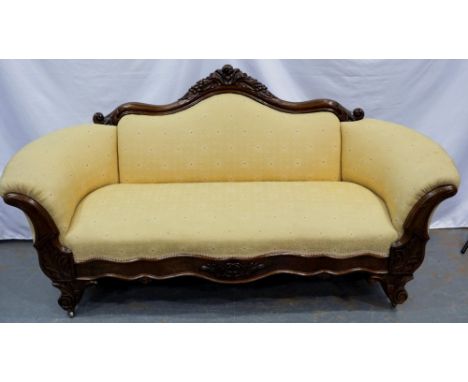 Carved walnut framed upholstered open settee on brass castors, L: 180 cm. Not available for in-house P&amp;P 