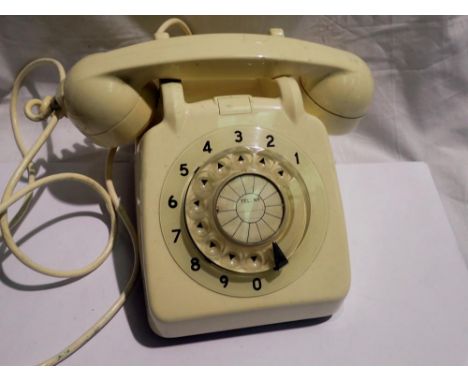 Ivory coloured Rotary telephone. P&amp;P Group 2 (£18+VAT for the first lot and £3+VAT for subsequent lots) 