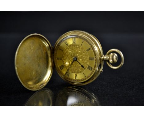A Victorian 18ct gold ladies Hunter cased fob watch, blue enamelled outer cover, initialled IC, gold floral dial, Roman numer