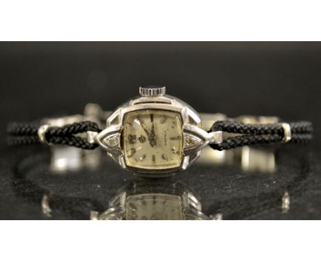 A vintage lady's Art Nouveau 14ct gold and diamond set cocktail/ dress watch, cushion dial marked Election, Arabic numerals, 