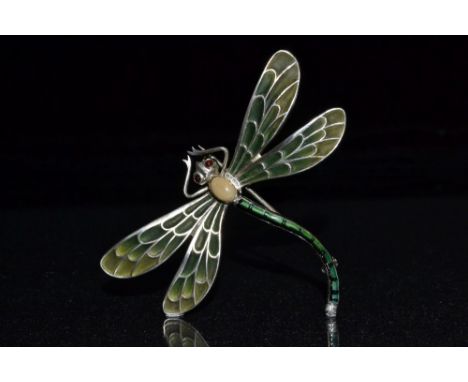 A Meyle & Mayer plique-á-jour dragonfly brooch, opal cabochon inset body, red gem set eyes, green and black enamelled body an